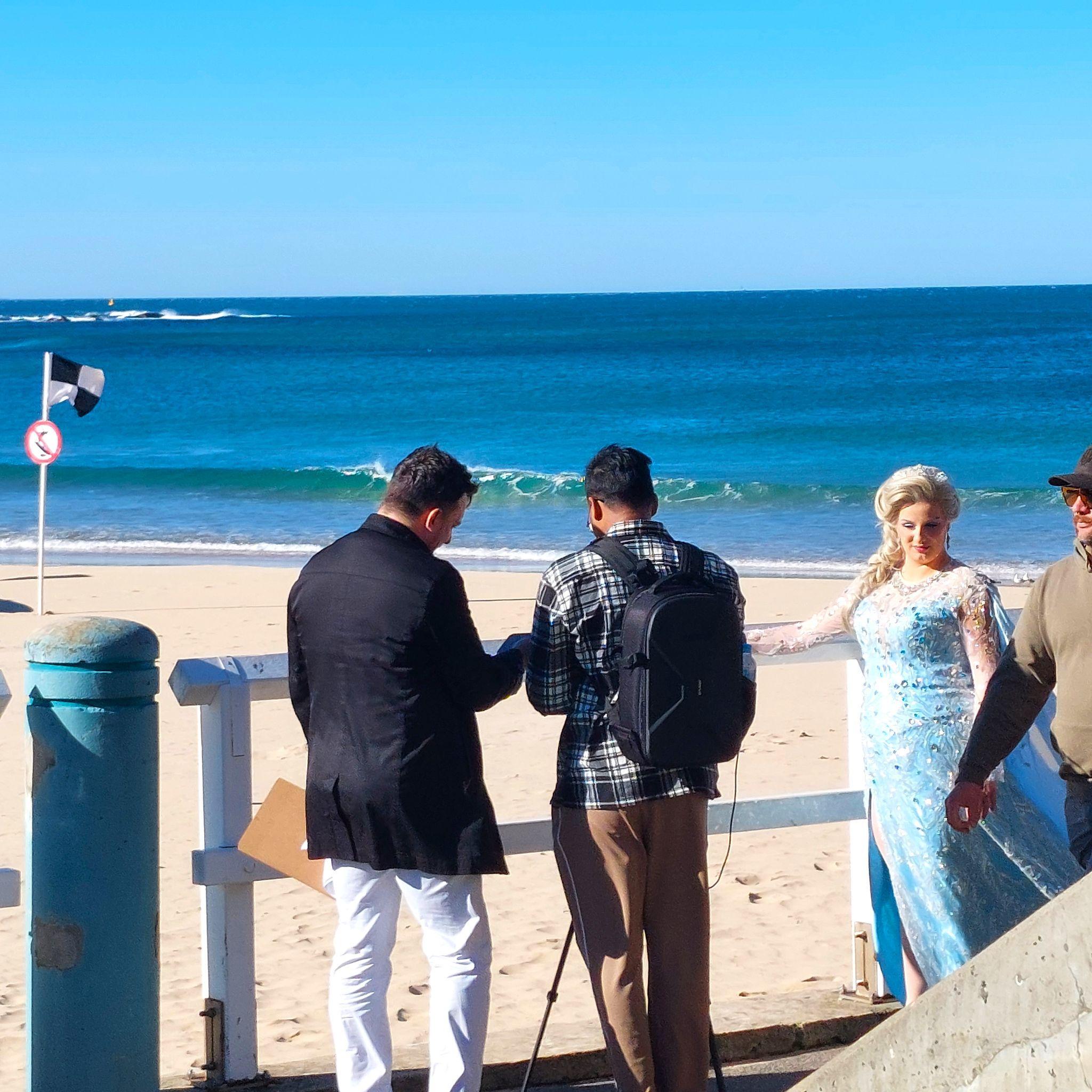 The TVG Creative Co. crew filming Elsa beside the Newcastle Ocean Baths